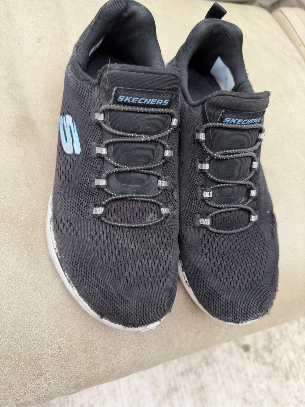 Size 6 used Skechers Black Slip-On Athletic Shoes with Light Blue Logo womens